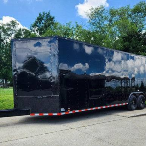8.5×28 Black V-Nose Enclosed Trailer with Blackout Pkg (2) 7K Axles
