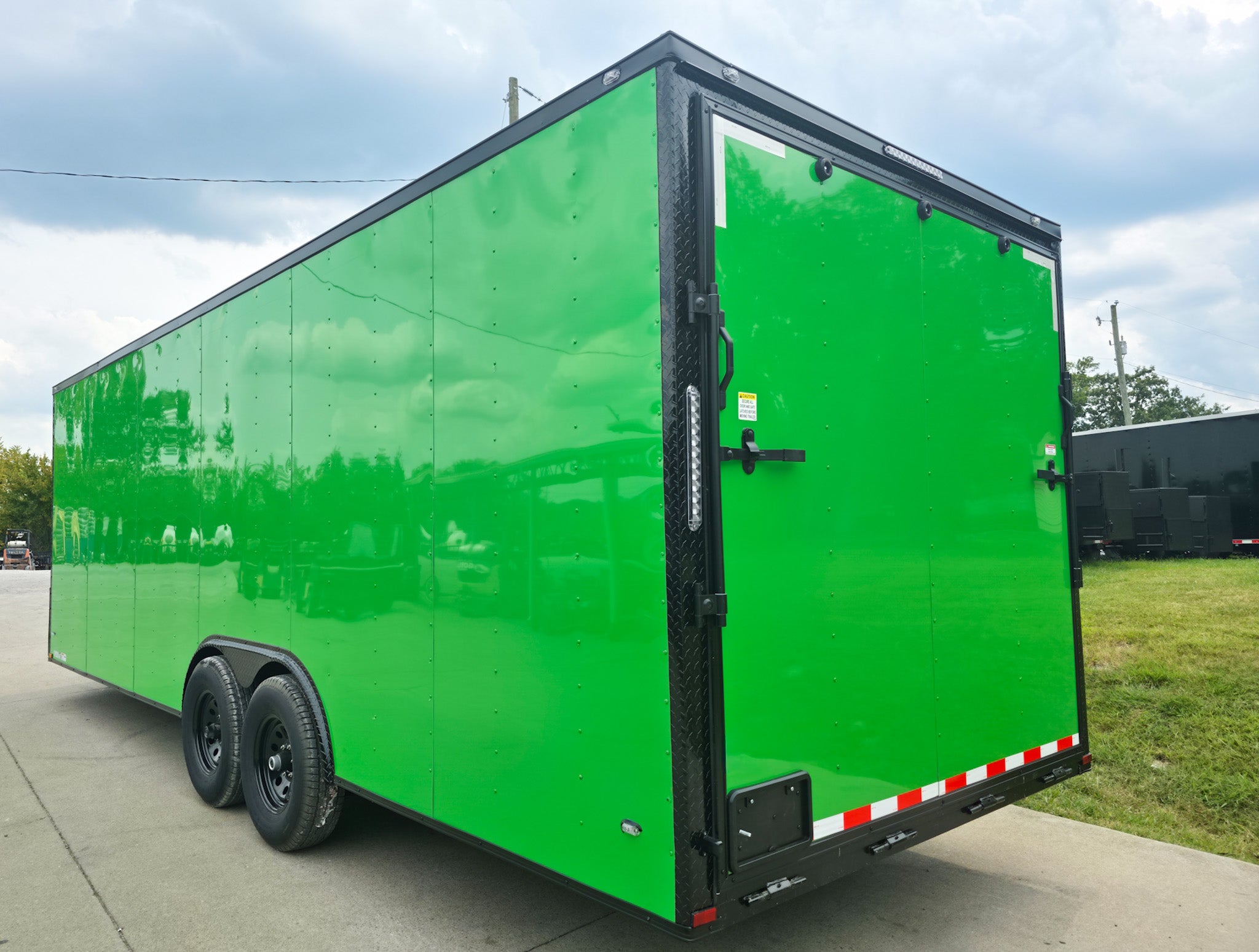 8.5×24 V Nose Neon Green Enclosed Trailer (2) 5200 LB Axles With Brakes 7 Ft Interior Height With Black Out Package - Image 6