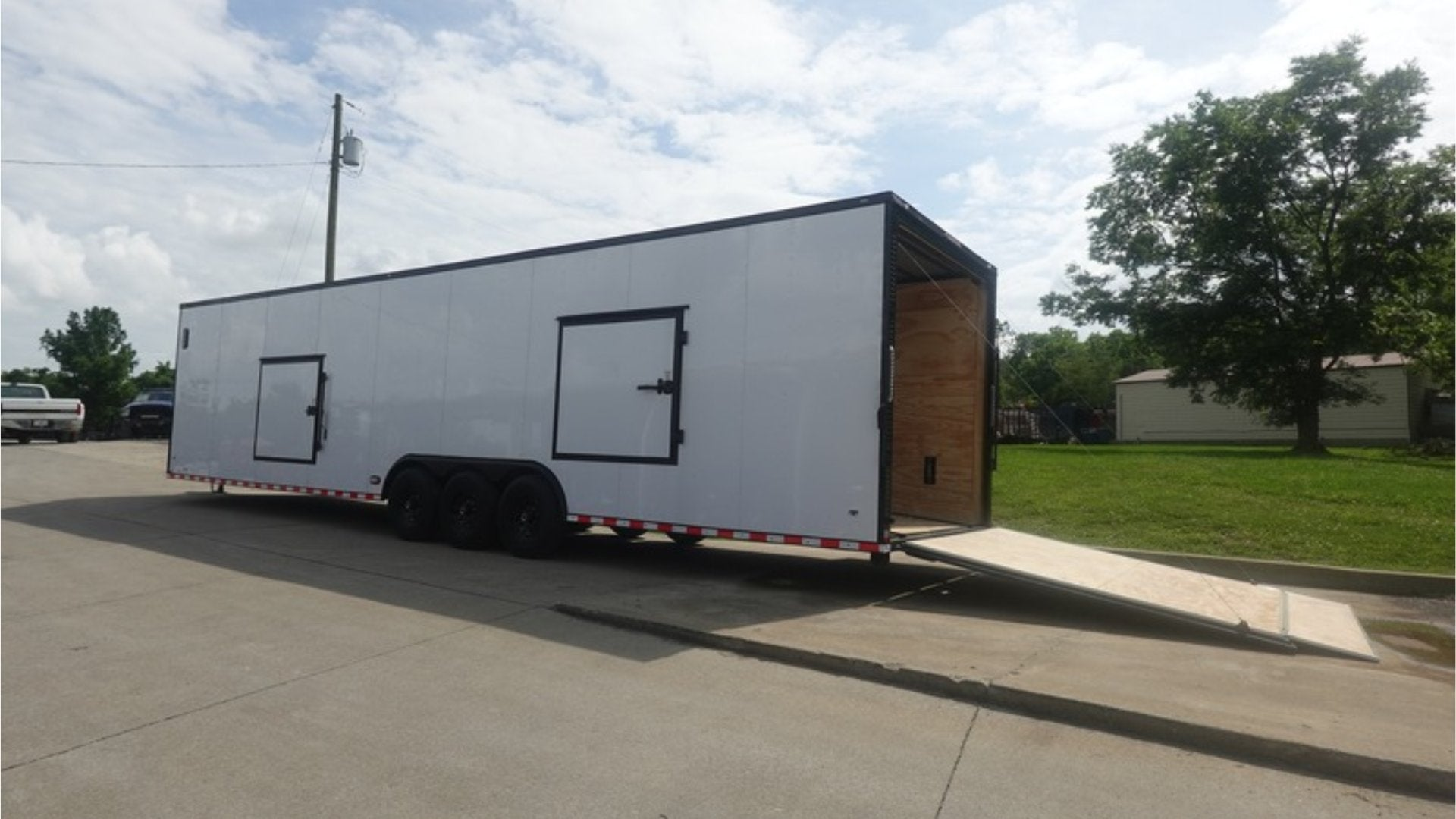 8.5X36 White With Black Out Enclosed Trailer With Escape Doors E Track Floor (3) 7K Axles 21K GVWR - Image 6