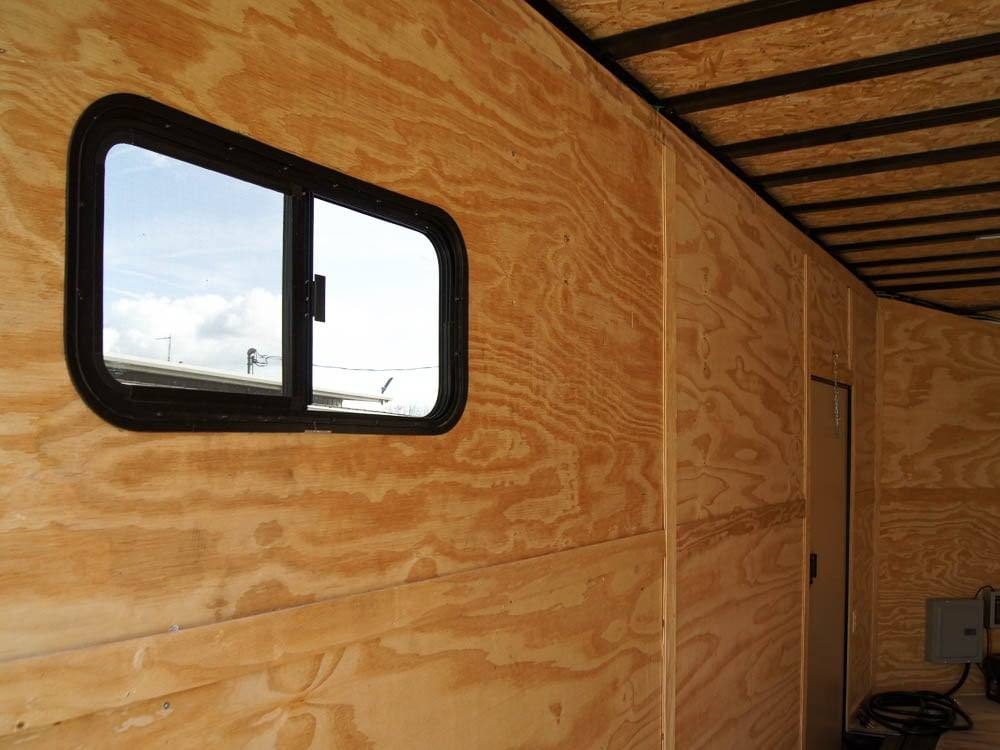 8.5×18 Blue V-Nose Slant Top Enclosed Trailer with Blackout Package - Image 19