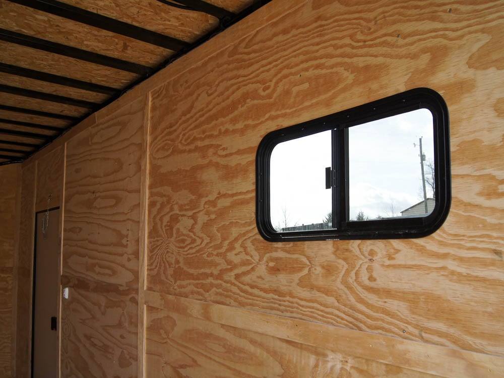 8.5×18 Blue V-Nose Slant Top Enclosed Trailer with Blackout Package - Image 20